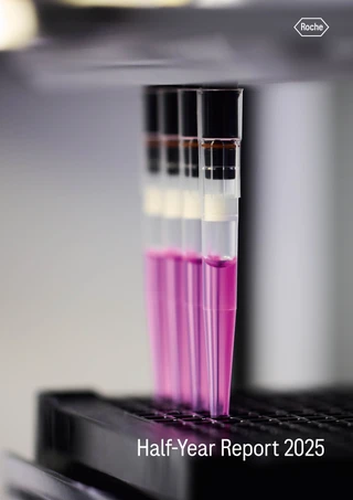 Close-up of test tubes with pink liquid in a lab rack, with "Half-Year Report 2025" text. The image has a scientific, focused feel.